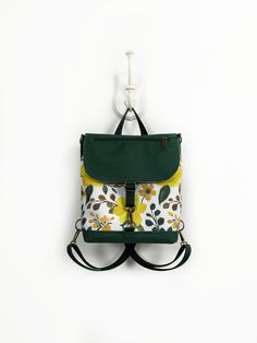 Cottagcore Style Floral Backpack, Women Crossbody Bag, Boho Mini Backpack, Customized Backpack, Vegan Purse, Mothers day Gift, Birthday Gift FEATURES  - waterproof outer - canvas lining - matches the chosen exterior color and pattern - handle at the top - outer zipped pocket (frontside) - outer vertical zipped pocket (backside)  - zipped pocket on the flap - reinforced bottom part  - inner zipped pocket - two inner open pockets - separated backpack straps  (adjustable and detachable) OPTIONAL - Green Backpack With Adjustable Strap For Daily Use, Retro Backpack With Adjustable Strap For Everyday, Green Backpack With Removable Pouch For School, Green Bags With Adjustable Straps For Daily Use, Trendy Green Tote Backpack, Green Tote Backpack With Adjustable Strap, Green Canvas Satchel Backpack, Green Backpack With Removable Pouch, Vintage Tote-style Backpack For Daily Use