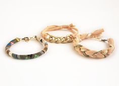 This is a set of three bracelets which are made in golden, beige, pink and green colors. Bohemian bracelets are great for stacking but you can wear them separately too. They are unique fashion accessory and look beautiful combined with watch. Two bracelets close with lobster clasp and one with sliding closure and they are very comfortable to wear.>>>Bracelet stack consists of these three bracelets:- fabric cord bracelet- aluminum chunky chain bracelet (does not tarnish) with beige jerse Boho Bracelets Stack, Bohemian Bracelets, Cord Bracelets, Braided Bracelets, Arm Candy, Bracelet Stack, Unique Fashion, Chain Bracelet, Rope Bracelet