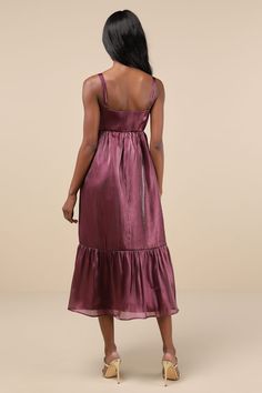 The first step towards being the best-dressed guest is making sure you arrive in the Lulus Extravagant Initiative Shiny Plum Organza Bow Midi Dress! Shiny, organza-like fabric shapes this insanely darling dress with slender adjustable straps that support a sleeveless bodice with a sweetheart neckline and a dramatic, oversized bow at the front. The babydoll-inspired silhouette features a high waist and an A-line skirt that falls to a tiered midi hem. Hidden side zipper/clasp. Fit: This garment fi Party Dress With Lined Organza Bodice, Party Organza Dress With Lined Bodice, Cocktail Organza A-line Dress, Formal Evening Organza Dress, Party Organza Midi Evening Dress, Organza Midi Length Evening Dress For Party, Organza A-line Cocktail Dress, A-line Organza Cocktail Dress, Fitted Organza Evening Dress