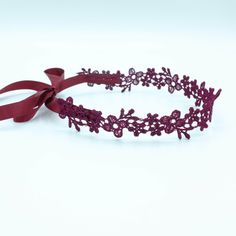 This eye-catching Astrid Burgundy Lace Choker Necklace is the ideal boho choker with satin ribbon to complete your chic look. Your go-to pick for expressing your boho style with a playful ribbon quirk. Ties up with a satin ribbon, giving you freedom over adjustability. Delicate yet durable Lightweight, wear-resistant design Blends it well with other jewelry items Flexible and feels easy on the skin Seamlessly ties up with satin ribbon Non-fraying edges keep the form intact Adjustable Fit LACE CH Elegant Adjustable Ribbon Headband, Adjustable Ribbon Hair Accessories For Parties, Elegant Ribbon Headband As A Gift, Elegant Ribbon Headband As Gift, Elegant Adjustable Ribbon Choker, Adjustable Red Bohemian Headband, Bohemian Adjustable Headband For Gift, Elegant Adjustable Headband For Gift, Adjustable Butterfly Knot Hair Accessory For Gift