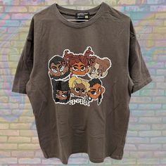 Label size: Large Recommended size: Large How it fits: Regular Pit to pit: 23" Shoulder to bottom: 29" Flaws: Photos show marks if any Material : 100% Cotton Era: Y2K Colour: Brown/Multicolor Oversized Y2k Tops With Cartoon Print, Oversized Y2k Tops With Logo Print, Oversized Y2k Crew Neck Top, Y2k Oversized Crew Neck Top, Oversized Y2k Top With Logo Print, Hip Hop Style Cotton Tops With Cartoon Print, Relaxed Fit Cartoon Print Tops For Streetwear, Oversized Cartoon Print Graphic Tee, Y2k T-shirt With Character Print For Streetwear