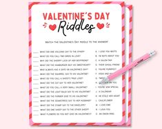 valentine's day riddles game with pink pen and red striped paper on top