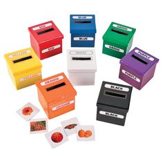 several different colored boxes with matching labels and numbers on the front one has a basketball in it