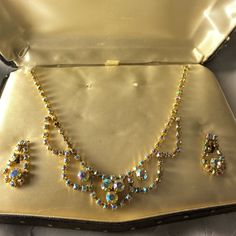 Vintage Jewels By Estrella Multicolor Reflecting Rhinestones Necklace & Earring Set Necklace 15 3/4” Earrings 1” Pretty Sure, Never Worn. Been In Its Jewelry Box Note: Missing One Rhinestone See Picture A Jeweler Could Take The Last One Out, On Back & Put It There. Rest Very Nice. Drop Dangle, Strand Earrings In Front Loop Center Stone Matches Center Stones In Necklace Beautiful Special Occasion Set Vintage Jewelry With Sparkling Stones For Party, Vintage Sparkling Stones Jewelry For Party, Vintage Party Jewelry With Sparkling Stones, Vintage Bling Jewelry For Party, Retro Jeweled Wedding Jewelry, Vintage Rhinestone Jewelry For Parties, Retro Rhinestone Jewelry For Gifts, Vintage Crystal Jewelry With Matching Earrings, Vintage Jeweled Jewelry For Parties