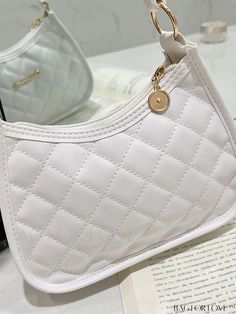 BagForLove - Quilted Letter Decor Baguette Bag with Elegant Detailing Product Description Color White Details Embroidery Bag Size Small Type Hobo Bag Style Elegant Pattern Type Quilted Closure Type Zipper Strap Type Top Handle Features Lightweight Material PU Size Chart INCH CM Bag Length Bag Width Bag Height Handle Height 8.3 inch 2.4 inch 5.9 inch 9.8 inch Bag Length Bag Width Bag Height Handle Height 21 cm 6 cm 15 cm 25 cm Details Pictures Similar Products h2 { text-align: center; } /* æ¢è¡ White Quilted Rectangular Shoulder Bag, White Quilted Shoulder Bag, White Quilted Crossbody Shoulder Bag, Trendy White Quilted Shoulder Bag, White Rectangular Baguette Bag With Zipper, Letter Decor, Embroidery Bags, White Details, Elegant Pattern