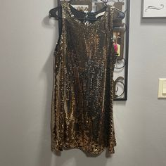 Nwt Caramela Sequin Party Dress Size Small, Made In The Usa Sleeveless Mini Dress For Night Out, Sleeveless Mini Dress For Evening Parties, Fitted Holiday Dress For Party Season Celebration, Gold Sleeveless Dress For Night Out, Chic Gold Sleeveless Party Dress, Chic Gold Sleeveless Dress For Party, Gold Dress For Date Night And Party Season, Gold Holiday Celebration Dress, Gold Festive Dress For Date Night