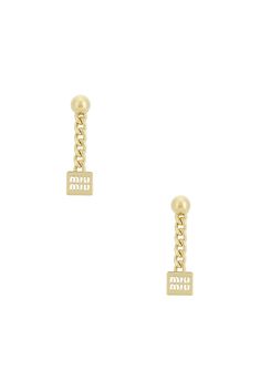 Find MIU MIU Logo Drop Earrings In Metallic Gold on Editorialist. Miu Miu Logo Drop Earrings in Metallic Gold Gold-tone metal earrings. Made in Italy. Post-back closure. Measures approx 1.5 dangling. MIUF-WL19. 5IO125. About the designer: Established in 1992 by Miuccia Prada, Miu Miu reflects fashion forward, light-hearted, and provocative women. The language of Miu Miu experiments with contemporary femininity, merging rebelliousness with minimalism in order to evoke a sense of freedom within lu Luxury Gold Earrings With Logo Charm, Elegant Gold Earrings With Logo Charm, Miu Miu Logo, Logo Jewelry, Versace Gold, Gold Pearl Earrings, Miuccia Prada, Diamond Drop Earrings, Diamond Drops