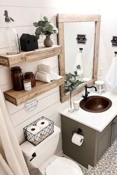 a bathroom with a sink, toilet and shelves