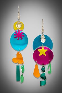 Aluminum Earrings - Fun, kinetic, lightweight, asymmetrical earrings feature shapes of the sun, moon, music, and stars that sway as if in a gentle breeze. Colors include turquoise, teal, fuchsia, orange, yellow, and lime. Handcrafted, anodized, and dyed by the artist.<br><br>Non-allergenic surgical steel ear wires or adjustable clips. Kinetic Light, Moon Music, Aluminum Earrings, Mom Earrings, Rear View Mirror Decor, Aluminum Jewelry, Asymmetrical Earrings, Paper Earrings, Art Earrings