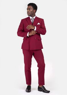 The Rockafeller Claret Red Stretch Suit is the perfect combination of sophistication and comfort. Crafted from premium stretch cotton fabric, this bold custom made suit exudes a modern look that will have you feeling as good as you look. Classic Fitted Burgundy Suit, Fitted Cotton Suit With Notch Lapel, Fitted Cotton Suits With Notch Lapel, Red Fitted Double Breasted Suit With Notch Lapel, Red Fitted Double Breasted Suit For Formal Occasions, Fitted Red Double Breasted Suit With Notch Lapel, Red Fitted Double-breasted Suit With Notch Lapel, Burgundy Fitted Suit For Semi-formal Occasions, Fitted Burgundy Suit For Business