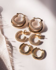 Double down on your earring game. Miles is the unexpected twist on the 14k gold plated classic hoop you didn't know you needed in your everyday earrings. Her peekaboo pave second hoop is playfully perfect and lightweight enough for daily wear. - Double tube pave hoop earrings- Hoop measures approx 22mm - 14k gold plated brass - Sterling silver post- Cubic zirconia pave accents Minimalist Hoop Jewelry With Pave Setting, Everyday Gold Plated Hoop Earrings With Diamond Accents, 14k Gold Hoop Earrings With Pave Setting, 14k Gold Pave Setting Hoop Earrings, 14k Gold Pave Hoop Earrings, Gold Hoop Earrings With Pave Setting, Small Hoop Earrings With Pave Setting, Everyday Gold Hoop Diamond Earrings, Everyday Tarnish Resistant Cubic Zirconia Hoop Earrings