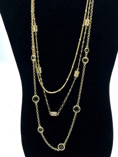 Collectible and vintage Gold multi strand gold tone with rhinestone necklace by Lia Sophia. Gold-tone Multi-strand Necklaces For Formal Occasions, Gold-tone Multi-strand Necklace For Formal Occasions, Gold Layered Chain Necklace For Party, Costume Jewelry Multi-strand Layered Necklace, Elegant Gold Chain Necklace With Jewels, Elegant Gold Layered Round Necklace, Formal Multi-strand Gold-tone Jewelry, Gold Multi-strand Costume Jewelry Necklace, Elegant Jeweled Gold Necklace