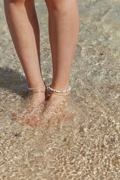 This beaded anklet features a collection of luminous freshwater keshi pearls and natural white puka shells to capture the essence of Hawaii’s white sand beaches. Wear this gold anklet alone or stacked for a classically elegant allure. ✦ DETAILS ✦✧ Name: Poa (POH ah) - pirate.✧ Adjustable Length up to 10" Inches.✧ White Freshwater Keshi Pearls.✧ White Natural Puka Shells.✧ 14kt Gold Filled Components, Extender, and Clasp.✧ All Ke Aloha Jewelry pieces come packaged thoughtfully, beautifully, and r Gold Chain Anklet, Elegant Anklet, Anklet Gold, Beaded Anklet, Puka Shell, Gold Anklet, Gold Flats, Figaro Chains, Figaro Chain