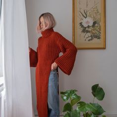 "Stylish asymmetric sweater with extra long wide sleeves in terra. Made with soft wool blend yarn. Materials: Wool / Acrylic (60/40) Color: terra Best fit: size S/M (oversized fit) Measurements: Width (from underarm to underarm): 19\" = 48 cm Length: 45.5\" = 116 cm Sleeve length (from the neck): 26.5\" = 67 cm Measures of Model in the photo Size: S Chest: 33\" - 83 cm Waist: 24\" - 62 сm Hip: 35\" - 88 cm Height: 5′ 6″ CARE INSTRUCTIONS: DRY CLEAN is the best way. HAND WASH. Make sure to use cold water and neutral soap. The less you touch and agitate them, the better. Do not press. MASHINE WASH. Please use only cold water and gentle (hand) cycle. Do not use tumble dry. FLAT DRY - reshape the garment to it's original shape. KEEP FLAT only. Do not hang! You can message me and get some addit Knitted Outfits For Women, Turtleneck Sweater Outfit, Oversize Outfit, Head Scarf Styles, Asymmetrical Sweater, Future Clothes, Womens Sweaters, Extra Long Sleeves, Oversized Knitted Sweaters