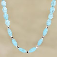 Inspired by the beauty of a clear blue sky, India's Shawn Martin creates this stunning beaded necklace with pretty calcite gemstones. The artisan hand threads oval, round, and cylindrical calcite stones alongside sterling silver beads, then finishes the necklace with a silver lobster claw clasp. Blue Calcite, Clear Blue Sky, Artisan Craft, Sterling Silver Bead, Silver Beads, Lobster Claw, Turquoise Necklace, Blue Sky, Beaded Necklace