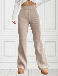 Turn heads in these stylish and comfortable tan ribbed knit flare pants. Made from a soft and stretchy fabric, these pants are perfect for any occasion. The high-waisted design flatters your figure, while the flared legs create a flattering silhouette. Dress them up with a blouse and heels for a night out, or dress them down with a t-shirt and sneakers for a day on the go. Features: High-waisted design Flare legs Ribbed knit fabric Stretchy and comfortable Available in a variety of sizes and col Ribbed Flare Pants, Knit Flare Pants, Flare Lounge Pants, Wide Leg Leggings, Silhouette Dress, 2024 Outfits, Fall Pants, Flared Leggings, Future Outfit