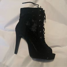 Ankle Booties With Sparkle. Never Worn And Will Ship With Plastic Coverings Over The Shoes. Small Imperfection (Purchased Like That) Shown In Photo. (Sequin Is Missing) Open Toe. Laces. Zipper Wide Width And Wide Calf Friendly. Torrid Shoes Tend To Run A Half To Whole Size Large So Anyone With A Size 9.5 To 10.5 Could Probably Wear Them. Black Lace-up Boots For Winter Evenings, Party Lace-up Winter Booties, Winter Party Lace-up Booties, Party Ankle Lace-up Boots Medium Width, Black High-top Party Booties, Black High-top Booties For Party, Black Ankle Lace-up Boots For Party, Black Lace-up Ankle Boots For Party, Winter High-top Heels For Night Out