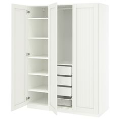 an open white closet with shelves and drawers