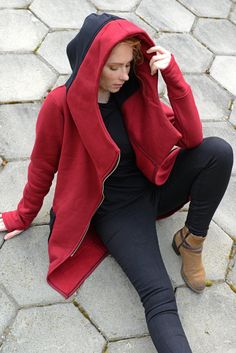 "Hooded Coat, Red Women Hoodie, Big Hood Hoodie Express Shipping to the USA, UPS Courier for free Delivery 3-5 Business Days Thanks for your love for the Hoodie/Tunic/Coat ♥ A short characteristic of this product... We present you a great asymmetrical sweater / jacket with a slightly longer front and a shorter length. The shirt has a unique shape and pattern, perfectly adhering to the silhouette. It has comfortable pockets that will fit all your trinkets, as well as a comfortable and large hood. Black Hooded Coat, Plus Size Coat, Pixie Outfit, Urban Apparel, Asymmetric Jacket, Asymmetrical Sweater, Tunic Hoodie, Women Streetwear, Hoodie Zip