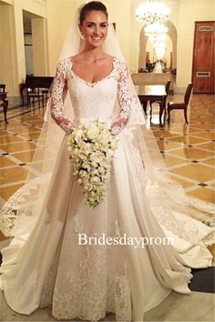 a woman in a wedding dress holding a bouquet