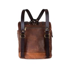 This backpack is practical and stylish, with security pockets, hidden closures, a grab handle on top, and two comfortable, adjustable back/shoulder straps. Use it for both travel and work with ease. Handcrafted of full-grain Italian calfskin in luxurious vegetable-tanned leather and crafted into stunning rustic bags and accessories that develop an enhanced patina with age. Made in Italy, each piece is finished with durable gingham linings and metal hardware. Dimensions: 14 x 12.5 x 5.5" WARNING: Travel And Work, Top Backpacks, Leather Roll, Back Shoulder, Bags And Accessories, Metal Hardware, Vegetable Tanned Leather, Italian Leather, Tuscany