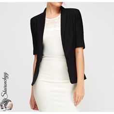 Details 3/4 Sleeve Black Blazer - 100% Polyester - L: 25" (Shoulder To Hem) - Single Button To Front Fastening - Lined - Open Pocket To Side New Without Tags Chic Short Sleeve Blazer For Workwear, Chic Short Sleeve Business Casual Blazer, Chic Short Sleeve Blazer For Work, Formal Short Sleeve Blazer For Spring, Chic Short Sleeve Blazer For Business Casual, Formal Short Sleeve Spring Blazer, Chic Short Sleeve Blazer For Formal Occasions, Elegant Formal Blazer With 3/4 Sleeves, Formal Spring Blazer With Short Sleeves