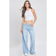 The trend report is in - Y2K is here to stay! Update your wardrobe with our Womens Low Rise Wide Leg Jean. These classic low-waisted denim pants have a hip-flattering silhouette that leads to a wide leg for a long, leggy look. Pair this jean with a lose-fitting button up and kitten heels for a business casual vibe, or a cute cropped top and tennis shoes for a sweet look that will transition you from daytime to nighttime. Product Details - Low-Rise - Single Button Closure - 5-Pocket Construction Low Rise Wide Leg Jeans, Ripped Denim Pants, Retro Jeans, Ripped Boyfriend Jeans, Update Your Wardrobe, Curvy Jeans, Trend Report, Women Essentials, Ripped Denim