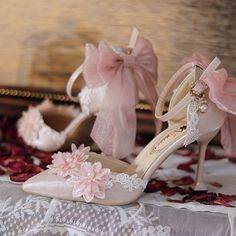 Step into a world of elegance and charm with these exquisite pointed-toe shoes, perfect for any Lolita or Kawaii fashion enthusiast. The upper is adorned with intricate bead-embellished floral patterns, beautifully complemented by delicate lace accents. Adding a whimsical touch, the heels are adorned with a delightful bow decoration, capturing the essence of femininity and grace. Embrace your unique style and let these shoes be the statement piece of your outfit.  Please note, the price includes Princess Shoes Heels, Lowkey Wedding, Fairy Heels, Royalty Dr, Pointed Sandals, Princess Sandals, Princess Heels, Crystal Wedding Shoes, Cute Shoes Heels