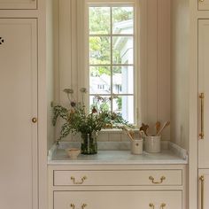 the kitchen counter is clean and ready to be used as a place for cooking utensils