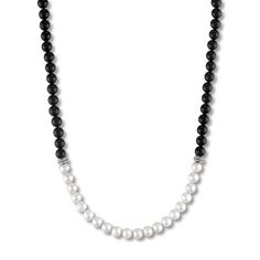 Lustrous freshwater cultured pearls are embraced by striking natural onyx beads in this vibrant men's necklace. Sterling silver Freshwater cultured pearls Natural black onyx The 28-inch necklacesecures in place with a lobster clasp. The signature "E" is stamped on the clasp to identify each piece as part of the 1933 by Esquire men's collection. Jared The Galleria Of Jewelry, Onyx Necklace, Onyx Bead, Freshwater Cultured Pearls, Men's Necklace, Necklace Sterling Silver, Natural Pearls, Cultured Pearls, Men's Collection