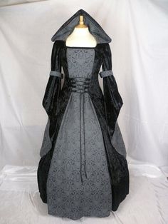 This is for a custom made dress,it will be made to the measurements you send me.Please send me your bust,waist and hip measurement,and please measure from the top of your shoulder to the floor with shoes on.It will be made with beautiful black crushed velvet and stunning grey and black jacquard.It will have a corset style front and back with black lacing so you can adjust the dress to fit your body shape.Combined shipping on multiple items.If you purchase express shipping by courier please send Customizable Length Ball Gown With Fitted Bodice, Gothic Fitted Gown For Fancy Dress, Fitted Gothic Gown For Fancy Dress, Elegant Black Gown For Fancy Dress, Fitted A-line Corset Dress For Costume Party, Fitted Gothic Ball Gown, Long Sleeve Wedding Dresses With Boned Bodice, Elegant Fitted Costume Dress, Gothic Floor-length Dress With Fitted Bodice