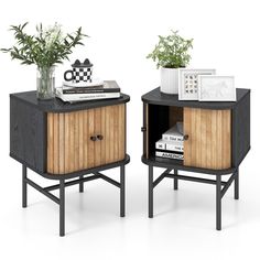 two side tables with plants and books on them, one is black and the other is brown