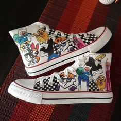 "⭐ FREE SHIPPING ⭐ What's your favorite 90s cartoon character's style? Now you can rock their look with your very own pair of 90s Cartoon high top sneakers! These stylish funky shoes are inspired by the characters from your favorite cartoons and are available in unisex sizes.  Each shoe is hand-painted by a unique artisan, so you know you're getting a one-of-a-kind product. A perfect boyfriend gift on a birthday or any occasion. Benefits: ⭐  A must-have for hip hop art fan ⭐  Available in unisex Casual Custom Sneakers With Anime Print, Casual Custom Sneakers With Character Print For Streetwear, Casual Low-top Custom Sneakers With Anime Print, White High-top Sneakers With Cartoon Print, Sporty High-top Sneakers With Character Print, Casual High-top Sneakers With Anime Print, Casual Anime Print High-top Sneakers, Cartoon Print Sneakers For Streetwear, White Casual Custom Sneakers With Anime Print