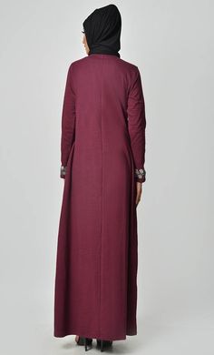 A perfect wardrobe piece for minimalistic style Round neck A stylish abaya with embroidered front and sleeves Includes both side pockets Full Sleeves FABRIC: Cotton Jersey CARE: Machine wash cold Long Sleeve Abaya With Modesty Panel For Fall, Fall Long Sleeve Abaya With Modesty Panel, Maxi Length Abaya For Fall Workwear, Long Sleeve Thobe For Eid, Fall Workwear Abaya In Maxi Length, Fall Workwear Maxi Length Abaya, Festive Long Sleeve Thobe With Floral Embroidery, Modest Long Abaya For Fall, Fitted Long Sleeve Abaya With Floral Embroidery