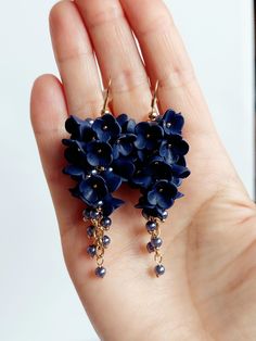 https://purplebeestudio.etsy.com Handmade polymer clay very delicate chandelier earrings. These elegant earrings in trendy  royal blue colour will become your favorits for many occasions day or night.  Perfect gift for a special woman in your life. Earrings made with brass ear wire. The earrings are very light and comfortable to wear all day. SHIPPING: Your order will be dispatched in a securely packed cardboard box. Product care:  - To ensure the product quality and durablility, avoid contact with water, lotion, perfumes and household cleaners and chemicals. - You can clean the products with a slightly damp soft fabric.  - Sharp objects can damage the clay surface. - When not in use, store in a dry, seperate box. Thank you for visiting my shop! If you have any special requests, I'll be ha Elegant Blue 3d Flower Earrings, Blue 3d Flower Earrings For Wedding, Blue Elegant Earrings With 3d Flowers, Elegant Blue Earrings With 3d Flowers, Elegant Blue Jewelry With 3d Flowers, Elegant Purple Polymer Clay Earrings, Blue Dangle Flower Earrings In Polymer Clay, Elegant Polymer Clay Flower Drop Earrings, Elegant Handmade Flower Polymer Clay Earrings