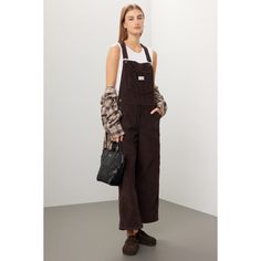 Brown denim (100% Cotton). Overalls. Sleeveless. Square neck. Front button closure. 7.5" from shoulder to hemline. Imported. Sleeveless Cotton Overalls With Button Closure, Brown Utility Overalls For Fall, Brown Sleeveless Overalls For Spring, Sleeveless Brown Overalls For Spring, Casual Sleeveless Overalls For Fall, Sleeveless Cotton Overalls For Workwear, Cotton Overalls For Everyday Fall Wear, Casual Everyday Overalls For Fall, Casual Everyday Fall Overalls