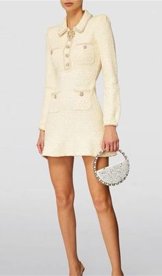 Sparkle and shine in our EMBELLISHED SEQUINED BOUCLÉ-KNIT MINI DRESS, designed to add a touch of glamour and opulence to any occasion! Crafted from a luxurious bouclé-knit fabric and embellished with shimmering sequins, this dress is sure to turn heads. Further enhanced by the flattering mini length, it'll be sure to make you stand out in style. Gentle Dry Clean OnlyColour may vary due to lighting on images. The product images (without model) are closest to the true colour of the product.Item ru Chic Evening Tweed Mini Dress, Chic Evening Mini Tweed Dress, Elegant Tweed Mini Dress For Night Out, Elegant Mini-length Tweed Dress For Night Out, Elegant Mini Tweed Dress For Night Out, Chic Embellished Fitted Tweed Dress, Beige Mini Dress For Fall, Chic Embellished Tweed Dress For Formal Occasions, Embellished Tweed Evening Dress