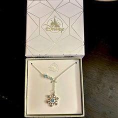 Disney Snowflake Necklace. Silver Tone With Beautiful Drop Down Snowflake And Blue And White Gems. New In Box. Makes A Great Gift! Disney Necklace, Snowflake Necklace, Kids Accessories Jewelry, Disney Accessories, Necklace Silver, Kids Accessories, Blue And Silver, Silver Tone, Jewelry Accessories