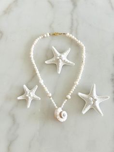 Hand made  Sea shell Necklace  Made with fresh water pearls and natural sea shell Gold plated hardware 16 inches in length Seashells Necklace, Sea Shell Necklace, Seashell Necklace, Fresh Water Pearls, Shell Necklace, Water Pearls, Shell Necklaces, Miami Fl, Sea Shell