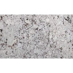 a white granite counter top with brown and black speckles