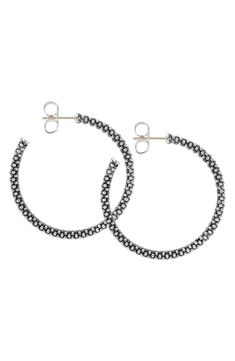 Caviar beading defines a sophisticated pair of hoop earrings cut from brilliant sterling silver. Style Name:Lagos Medium Caviar Hoop Earrings. Style Number: 254835. Available in stores. Sterling Silver Oxidized Hoop Earrings, Sterling Silver Hoop Earrings With Oxidized Finish, Elegant Sterling Silver Hoop Earrings With Oxidized Finish, Elegant Oxidized Sterling Silver Hoop Earrings, Silver Sterling Diamond Cut Hoop Earrings, Elegant Round Hoop Earrings With Oxidized Finish, Hoop Silver Beads Jewelry Gift, Hoop Silver Bead Jewelry Gift, Silver Beads Hoop Jewelry For Gift