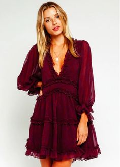 Burgundy Dress - Backless Dress - Cute Ruffle Dress - Mini Dress | Bohopink Update your semi-formal look with the Air of Romance Burgundy Print Dress! Burgundy and plum floral print lightweight fabric forms this cute mini dress. Features plunging v-neckline, attached sheer long sleeves ruffle tiered skirt forms this one of a kind mini dress. Elastic ruffle cuffs and ruffle-trimmed cutout open back finishes the look. Lined. Chic Mini Dress With Smocked Back And Balloon Sleeves, Party Mini Dress With Smocked Back, Party Mini Dress With Balloon Sleeves And Ruffles, Party Mini Dress With Ruffles And Balloon Sleeves, Mini Dress With Gathered Sleeves For Brunch, Balloon Sleeve Ruffled Mini Dress For Party, Elegant Puff Sleeve Mini Dress With Smocked Back, Elegant Mini Dress With Puff Sleeves And Smocked Back, Flirty Puff Sleeve Dress With Smocked Back