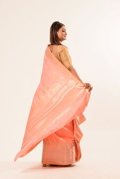 Discover the elegance of our Peach Katan Banarasi Silk Saree with intricate handwoven designs and a stunning gold temple border. Traditional Semi-stitched Peach Saree, Peach Saree With Zari Weaving For Wedding, Peach Wedding Saree With Zari Weaving, Traditional Peach Wear With Zari Work In Traditional Drape, Peach Art Silk Traditional Wear With Pallu, Traditional Peach Wear With Zari Work, Festive Peach Banarasi Silk Traditional Wear, Traditional Peach Saree For Festive Occasions, Traditional Peach Saree For Festive Season