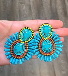 Beautiful statement earrings! Lightweight crochet with tiny stones and beads! Very intricate work! Perfect fo all those upcoming summer parties and vacations! Approx 2" by 2.5" Bohemian Embellished Beaded Earrings, Turquoise Bohemian Earrings For Beach, Bohemian Turquoise Earrings For Beach, Embellished Summer Jewelry, Turquoise Summer Party Jewelry, Colorful Beaded Teardrop Earrings For Beach, Colorful Beaded Earrings For The Beach, Bohemian Beaded Dangling Earrings For Vacation, Handmade Teardrop Earrings For Vacation