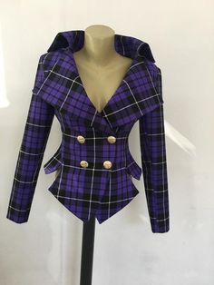 This is a very stylish and elegant jacket . Leght  58cm - at back. Fully lined. A jacket especially made to turn heads and give you that wow factor :)SIZE CHARTSIZE S - US 6, UK 8, EU 36bust: bust around 34.5”/90cmWaist: waist around 27.5”/70cmHips: hips around 34.5”/90cmSIZE M - US 8, UK 10, EU 38bust: bust around 37.5”/95cmWaist: waist around 29.5”/75cmHips: hips around 37.5”/95cmSIZE L - US 10, UK 12, EU 40bust: bust around 39.5"/100cmWaist: waist around 31.5”/80cmHips: hips around 39.5”/100c Fall Party Outerwear With Suit Collar, Winter Formal Punk Outerwear, Punk Style Formal Winter Outerwear, Trendy Fitted Outerwear With Suit Collar, Fitted Long Sleeve Blazer For Winter, Fitted Hooded Punk Outerwear, Fitted Long Sleeve Blazer For Fall, Double-breasted Fall Party Blazer, Trendy Fitted Outerwear With Lapel Collar