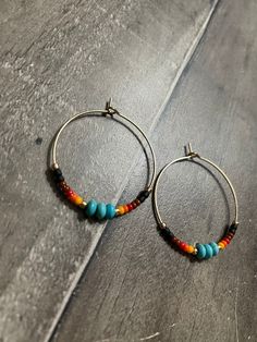 Aztec sunset seed bead and turquoise stone beaded gold hoops Bohemian Heishi Beads Small Hoop Earrings, Bohemian Heishi Beads Hoop Earrings, Bohemian Small Hoop Heishi Bead Earrings, Bohemian Heishi Beaded Hoop Earrings, Bohemian Hoop Beaded Earrings With Heishi Beads, Bohemian Hoop Earrings With Heishi Beads, Handmade Bohemian Hoop Beaded Bracelets, Bohemian Hoop Earrings With Gold Beads Adjustable, Bohemian Tiny Beads Hoop Jewelry