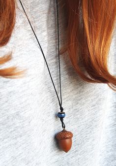 Handmade pendant  with natural acorn, which was picked right after it fall off of the oak tree. It was allowed to dry, cleaned and gently attached to the cap. Also, I added some colorful beads to give it a special touch. The pendant has a black thread chain to carry on your neck. The thread is 40 cm length (if you want to get a longer thread, please let me know and I will add an extra length). This forest necklace will always keep a piece of my touch. It will gently adorn your neck and hold warm wishes inside. It could be worn as a talisman to keep you safe, attract success and love; The acorn necklace can be a real treasure for all nature lovers; It is really cute, pretty little thing and I hope you will enjoy this talisman as much as I have had to create it ♥ DIMENTIONS & SPECIFICS: ▶MAT Peter Pan Jewelry, Oak Acorn, Acorn Jewelry, Forest Necklace, Necklace With Beads, Thread Chains, Acorn Crafts, Acorn Pendant, Acorn Necklace