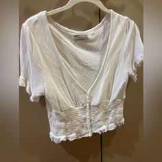 Selling A Ton Of Clothes That Just Don’t Fit Anymore/Never Worn/ Hardly Worn. Pls Look At My Page And Bundle!!:) Cream Smocked Crop Top Blouse. Condition: Very Good Size: Medium Casual Cropped Tops For Daywear, Summer V-neck Top For Daywear, Urban Outfitters White V-neck Tops, Trendy V-neck Tops From Urban Outfitters, Urban Outfitters V-neck Crop Top, Urban Outfitters V-neck Summer Blouse, Casual V-neck Blouse By Urban Outfitters, Summer Cropped Tops For Daywear, Urban Outfitters Cotton Tops For Vacation