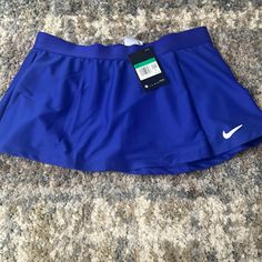 Nike Tennis Skirt New With Tags Size Girls Xl Stretch Blue Tennis Skirt With Pockets, Blue Stretch Tennis Skirt With Pockets, Blue Sports Skort With Pockets, Blue Stretch Casual Swim Skirt, Blue Stretch Swim Skirt Casual Style, Casual Blue Stretch Swim Skirt, Blue Sporty Stretch Mini Skirt, Sporty Stretch Blue Mini Skirt, Sporty Blue Stretch Mini Skirt