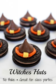 chocolate cookies decorated with orange and black icing